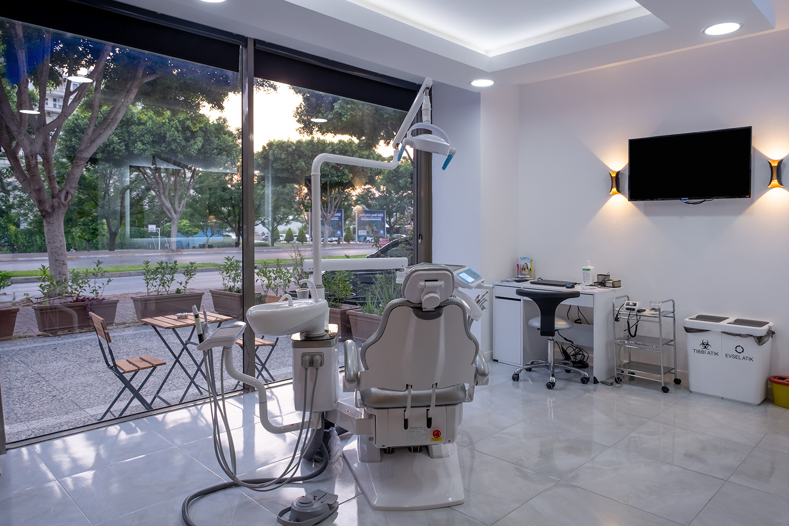 Modern dental treatment room in Turkey with comfortable chair and outdoor view