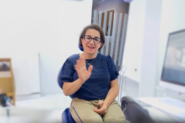 Patient sharing her dental implants experience at Quadro Dental